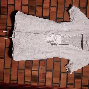 Short, smal,l white dress, from baby studio